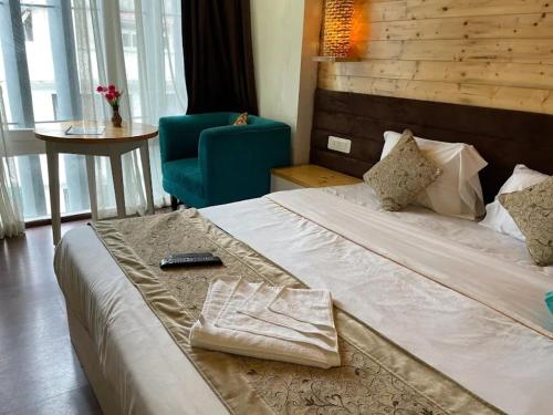 Ένα ή περισσότερα κρεβάτια σε δωμάτιο στο Elements Boutique Hotel