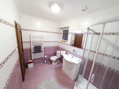 Koupelna v ubytování Apartmany Orava