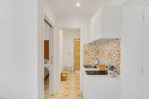 a kitchen with a sink and a counter top at Casa Levante Luxury Apartments Capri in Capri