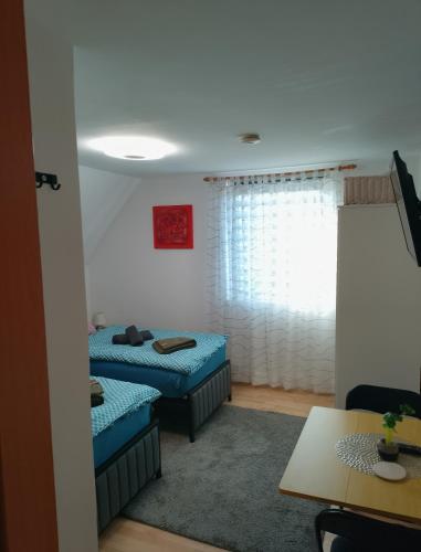 Кровать или кровати в номере Privatzimmer Landblick