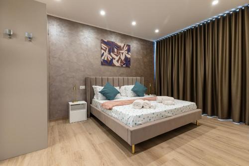 Giường trong phòng chung tại Le Ville Negli Ulivi