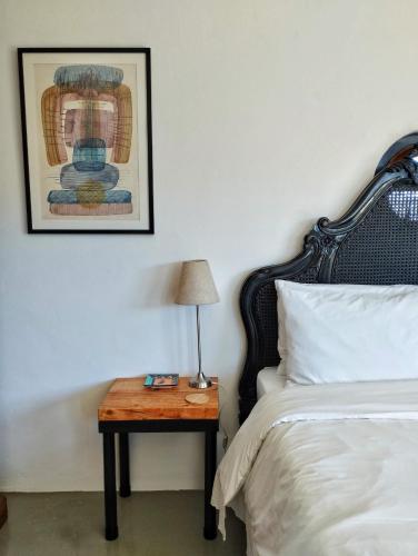 Postel nebo postele na pokoji v ubytování Quirky Bird