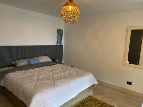Katil atau katil-katil dalam bilik di Marina Beach Front 3 Br Duplex