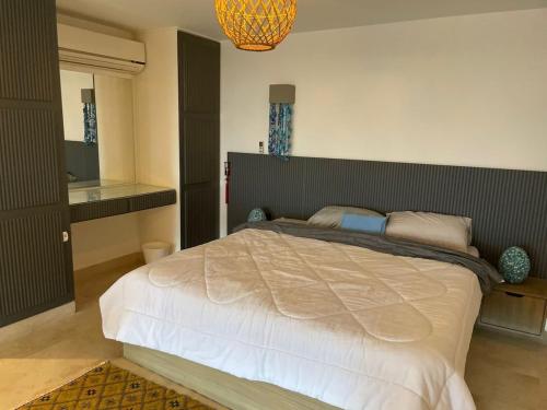 Katil atau katil-katil dalam bilik di Marina Beach Front 3 Br Duplex