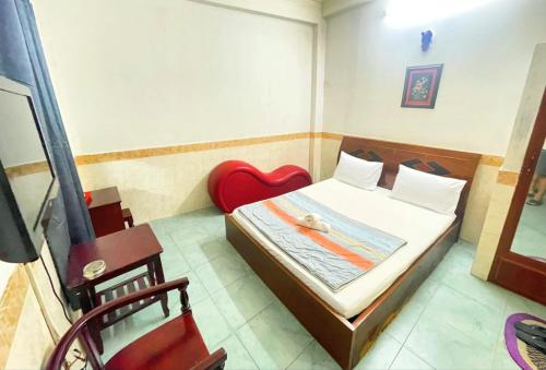 Katil atau katil-katil dalam bilik di Ngọc Hương Hotel