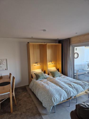 Ένα ή περισσότερα κρεβάτια σε δωμάτιο στο Ferienhaus "Boomen"