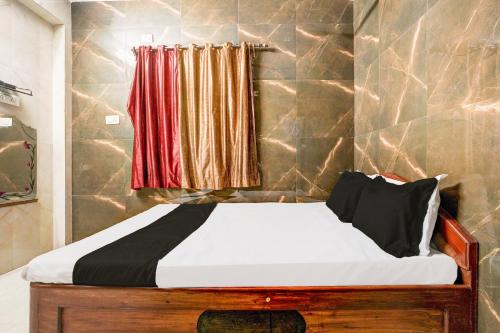 Katil atau katil-katil dalam bilik di Hotel O Tulsi Resort