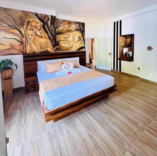 Ένα ή περισσότερα κρεβάτια σε δωμάτιο στο Sinha VIlla