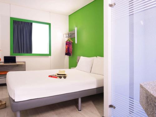 Postel nebo postele na pokoji v ubytování ibis budget Barranquilla