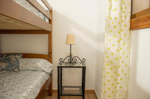 En eller flere senge i et værelse på Vivienda Vacacional Luna El Paso