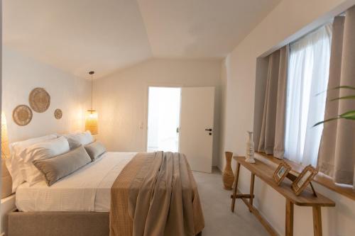Postel nebo postele na pokoji v ubytování Amore Luxury Villas