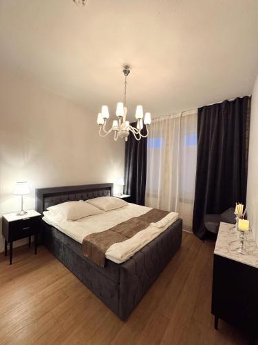 Ένα ή περισσότερα κρεβάτια σε δωμάτιο στο Athos Apartment, Abholung Schlüssel Domplatz 30