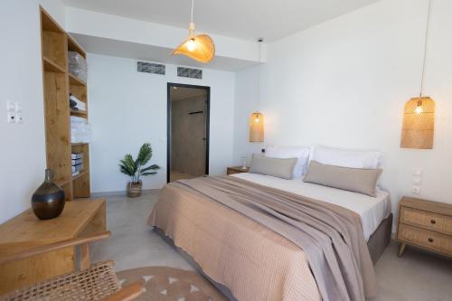 Postel nebo postele na pokoji v ubytování Amore Luxury Villas