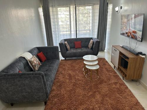 Posezení v ubytování Ecostay condo
