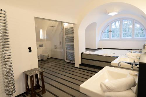 Ένα ή περισσότερα κρεβάτια σε δωμάτιο στο Landhaus am Jungfernsee