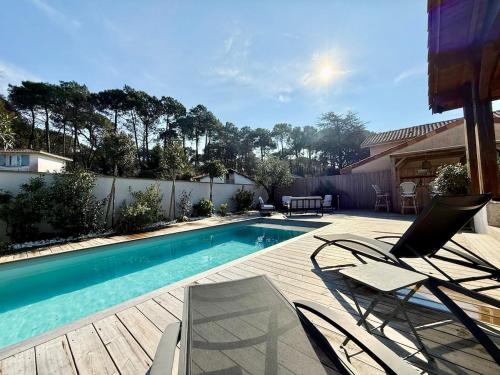 Sublime maison de vacances piscine au cœur des pins, proche plage