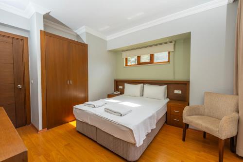 Pine Valley Hotel Oludenizにあるベッド
