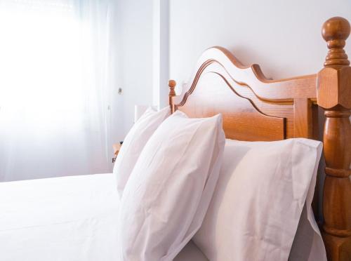 Katil atau katil-katil dalam bilik di Apartamento O Cobo Miño
