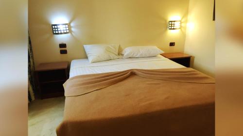 Postel nebo postele na pokoji v ubytování Hotel Marimba Punta Cana