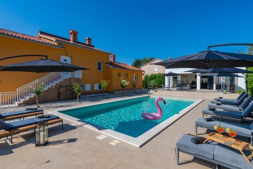 Villa Noa's Pool House, a modern and luxurious villa near the sea