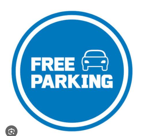 a free parking sign with a car in a circle at Montalban GuestHouse 2 AC BR 4pax 200mbps WiFi FREE Netflix Shower Heater Parking in Rodriguez