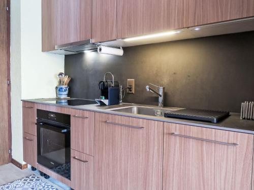 Kuchyň nebo kuchyňský kout v ubytování Apartment Les Bluets by Interhome