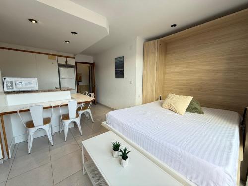 Ένα ή περισσότερα κρεβάτια σε δωμάτιο στο Agi Pi Sunyer Apartments
