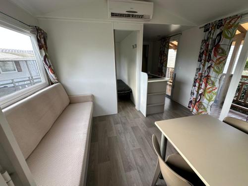 Posezení v ubytování Bungalow 4-6 personnes