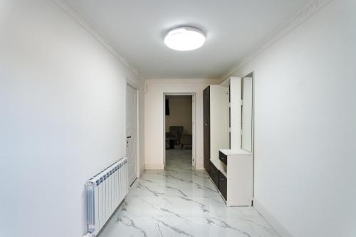an empty hallway with white walls and a ceiling at Villa Ashtarak in Ashtarak