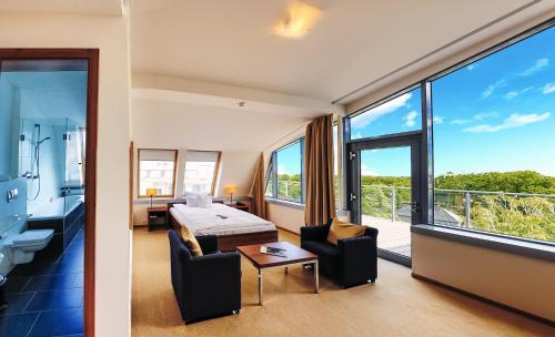 Katil atau katil-katil dalam bilik di THE GRAND Ahrenshoop