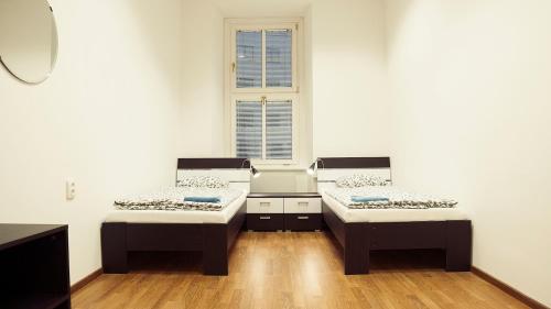 Voodi või voodid majutusasutuse Hostel Folks toas