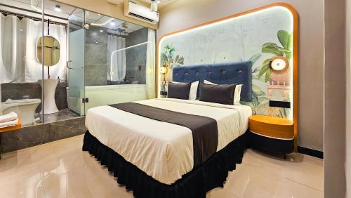 Postel nebo postele na pokoji v ubytování Hotel Nova Stays
