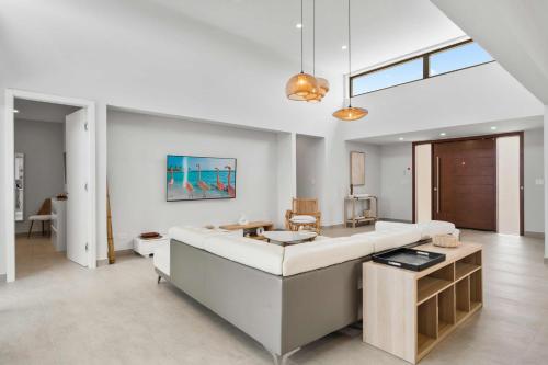 a large living room with a couch and a table at Safir 40 in Palm-Eagle Beach