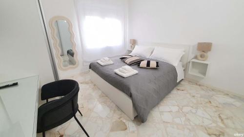 Ένα ή περισσότερα κρεβάτια σε δωμάτιο στο Akita Suite