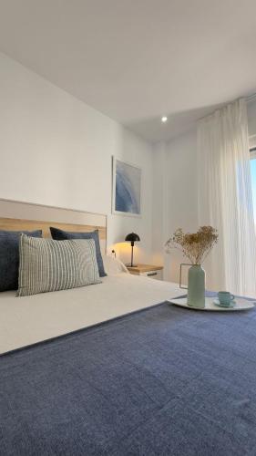 Ένα ή περισσότερα κρεβάτια σε δωμάτιο στο Marea