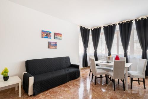 a living room with a couch and a table at Like At Home Venice - Mestre in Mestre