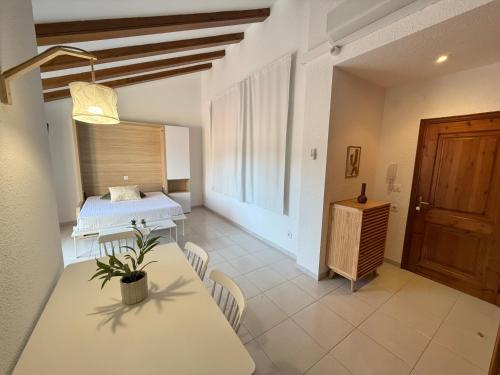 Ένα ή περισσότερα κρεβάτια σε δωμάτιο στο Agi Pi Sunyer Apartments