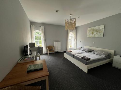 Una cama o camas en una habitación de Bett4-you Pinneberg