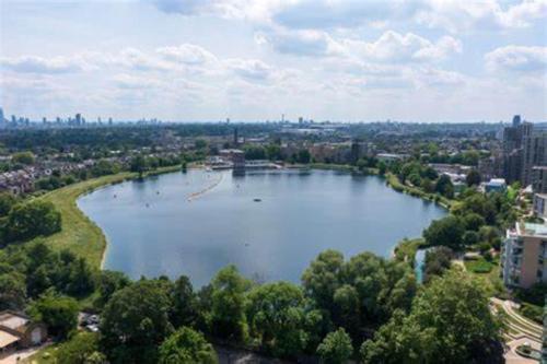 an aerial view of a large lake in a city at Studio 6 Suites Perry, GA in Perry