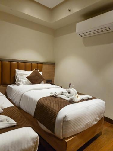 Ένα ή περισσότερα κρεβάτια σε δωμάτιο στο Hotel Season 4 -3-star hotel
