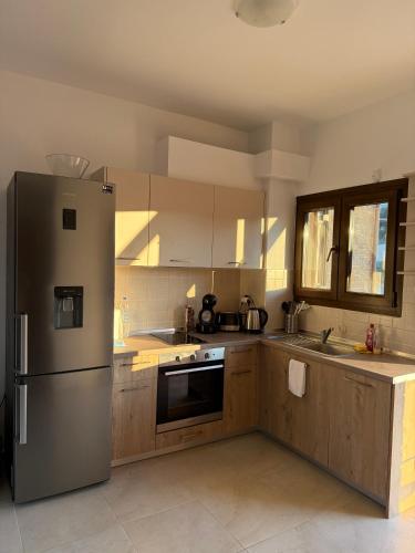 Kuchyň nebo kuchyňský kout v ubytování Villa KaliDari