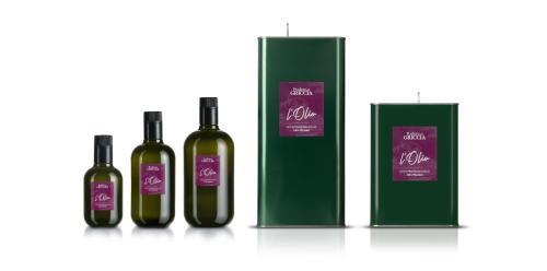a group of three bottles of wine on a table at Podere Del Griccia in Civitella in Val di Chiana