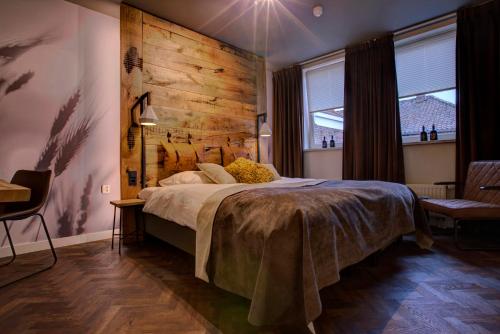 Hotel De Maasparel Arcenにあるベッド