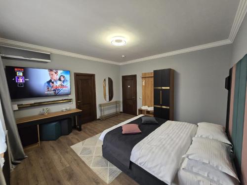 Postel nebo postele na pokoji v ubytování Hotel Yarus