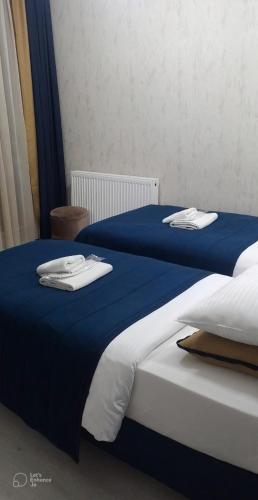 Postel nebo postele na pokoji v ubytování BALPETEK HOTEL