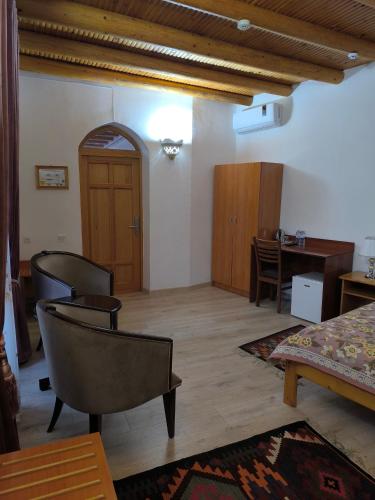 Coin salon dans l'établissement Bibikhanum Hotel