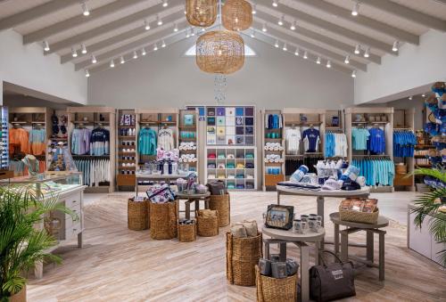 a store with a lot of clothes on display at Sandals South Coast All Inclusive - Couples Only in Savanna-la-Mar