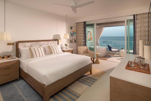 Una cama o camas en una habitación de Sandals Dunns River All Inclusive Couples Only