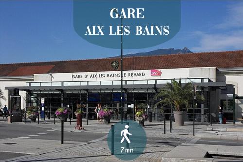 a building with a sign that says care at las balls at Appartements EPICURIEUX hyper centre ville, calme - SEJOURAIXLESBAINS in Aix-les-Bains