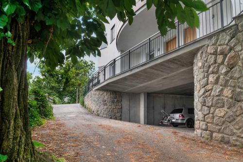 a garage with a car parked under a building at Haus Pferscher in Barbiano